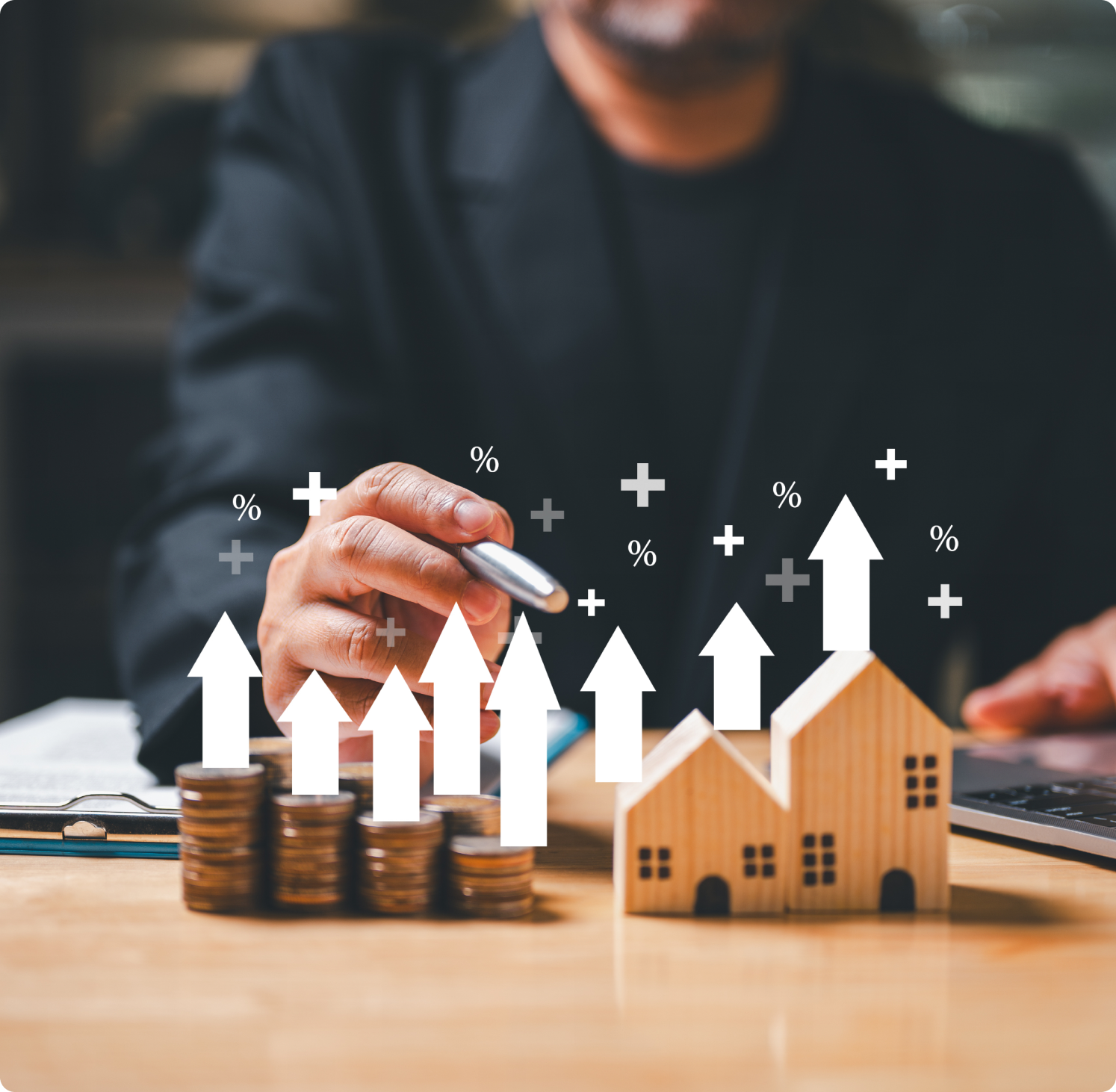 Businesswoman analyzing financial graphs on screen