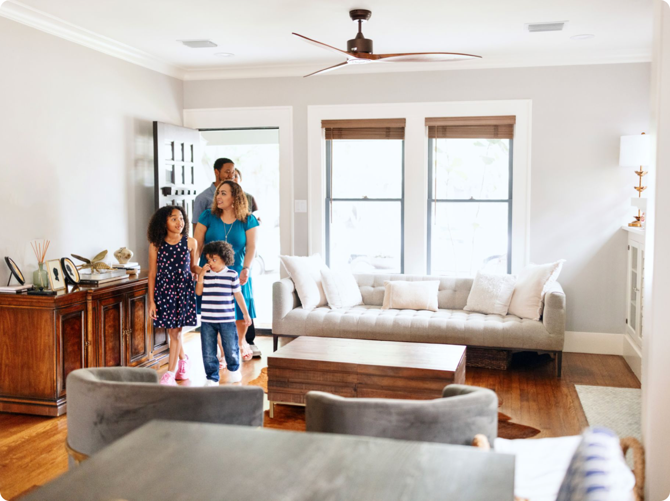 Family walking into cozy living space