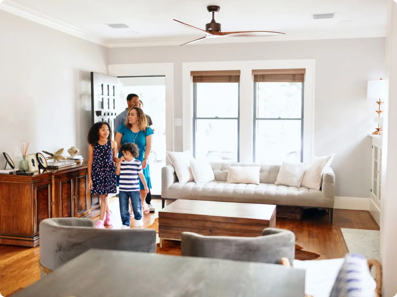 Family walking into cozy living space